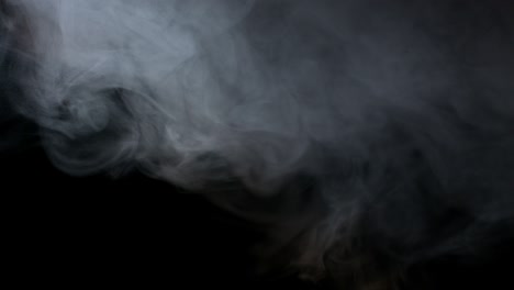 white water vapour on a black background