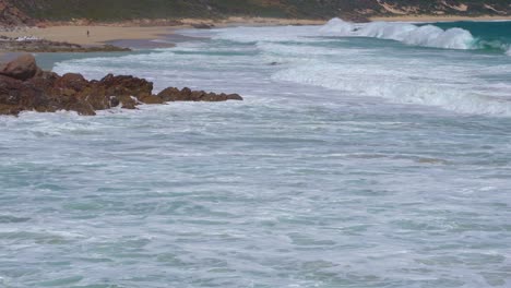 Amazing-rocky-coast-of-Margaret-River-with-turquoise-clear-water-breaking-against-the-rock-formation