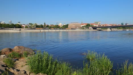 Vistula-river-and-city-skyline-of-Warsaw,-capital-of-Poland