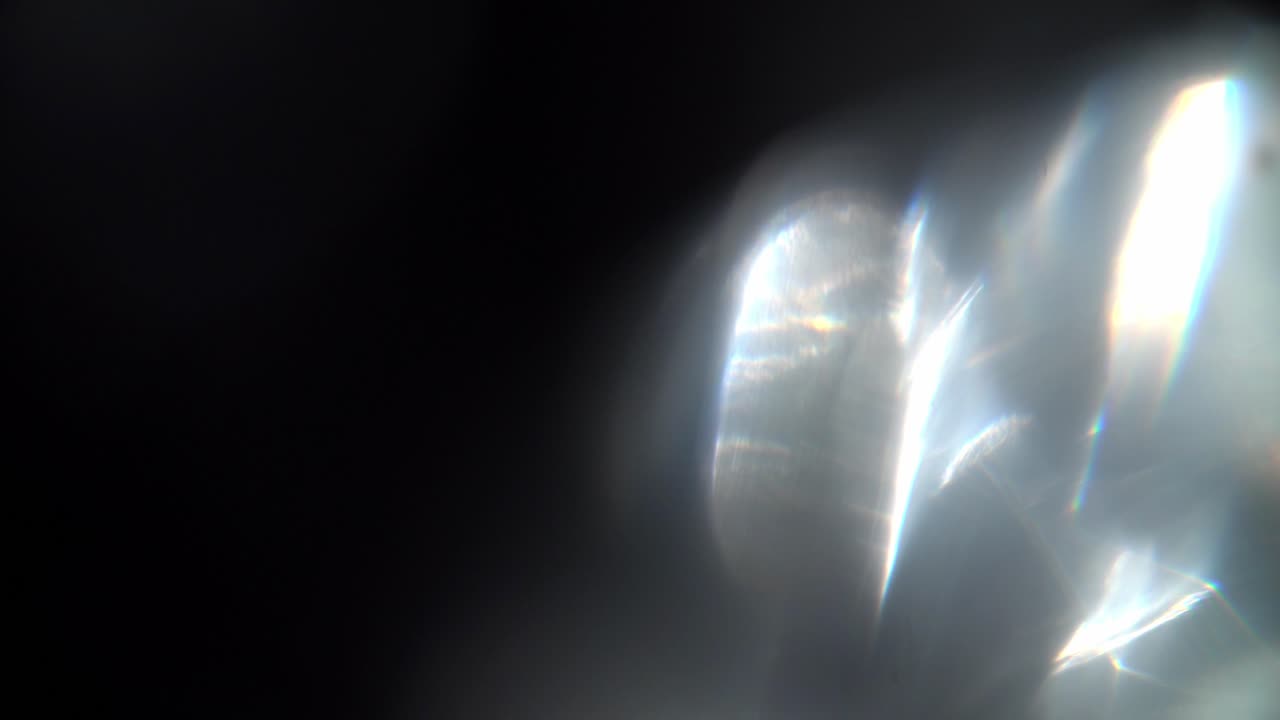 Sovrapposizione dinamica e colorata di perdite di luce e bagliori dell'obiettivo