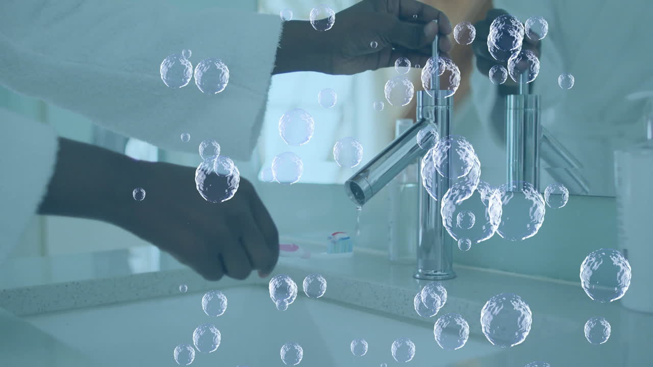 화장실 싱크대에서 손을 는 것, 거품 애니메이션이 사람 주위에 떠다니는 것