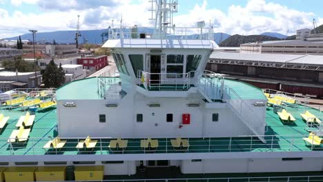 Wheelhouse-And-Empty-Chairs-At-Deck-Of-Ferry-Boat-Docked-At-Port-Of-Ploce-In-Croatia