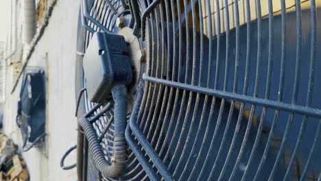 big industrial fan close-up on a factory. ventilation of industrial plant building. video background