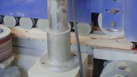 wood panel processing machine in action