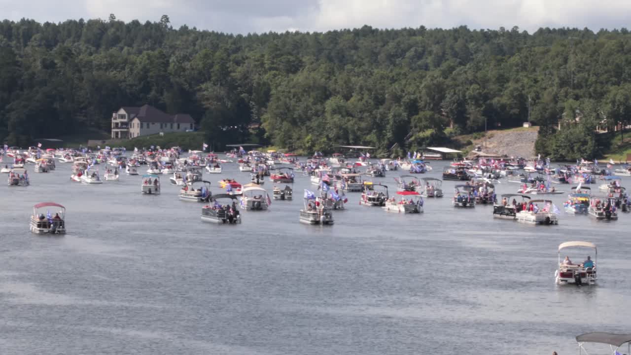 Boats decorated to support USA Trump Pence 2020. Hundreds of boats came out for the Trump 2020 boat parade on Lake Hamilton in Hot Springs.