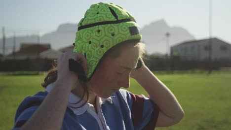 Young-adult-female-rugby-player-on-a-rugby-pitch