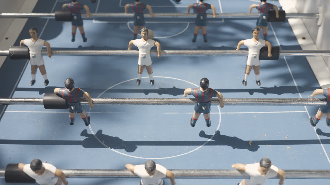 a close up of a vintage table football game