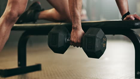 Man,-dumbbell-and-weightlifting-on-bench