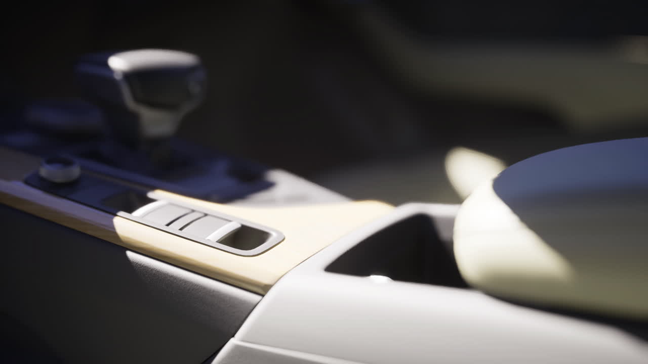 Interior details of modern vehicle showcasing gear shift and console design