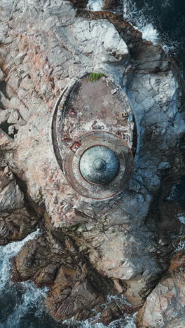 ruined lighthouse on a rocky coast