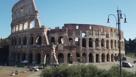 sunlit interior and exterior walls of roman colosseum still standing