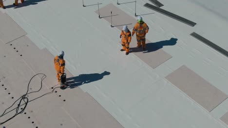 working on an industrial rooftop