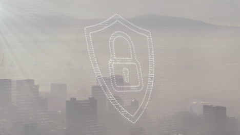 Animation-of-padlock-and-shield-icon-over-modern-cityscape