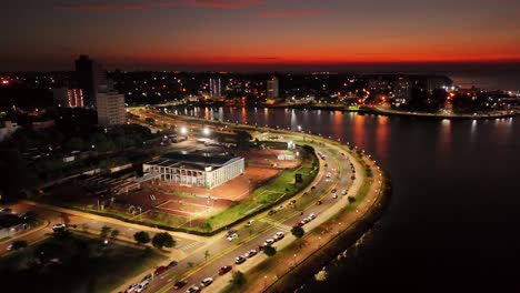 aerial forward shot of posadas city scape at night, argentina