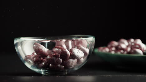 purple candy in a glass bowl