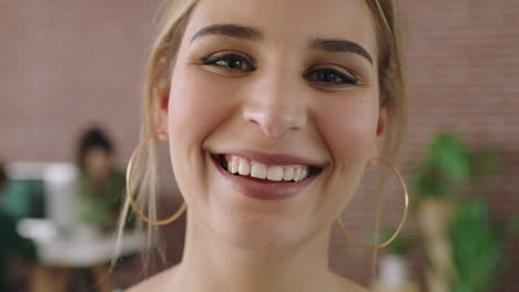 portrait of beautiful young woman in contemporary office laughing cheerful enjoying start up business opportunity