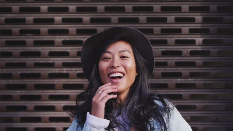 Mixed-race-woman-smiling-at-the-camera