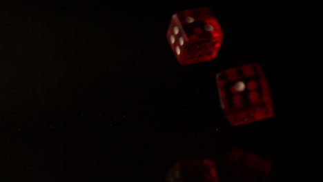 red dice rolling and bouncing