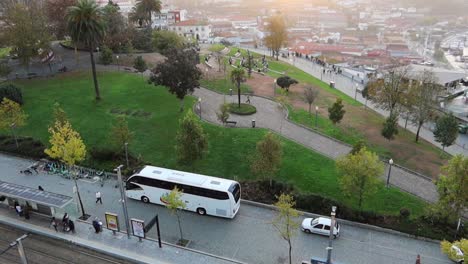 high-angle panning shot of scenic jardim do morro with people at sunset