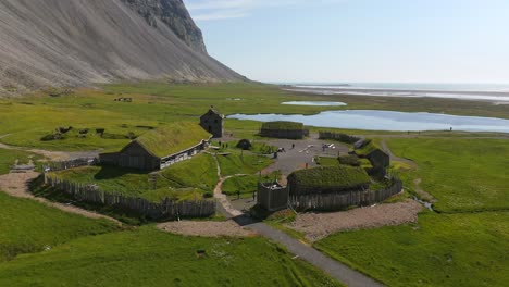 explore the vibrant colors and textures of viking village in this captivating drone video, showcasing the unique blend of culture and nature in the heart of iceland.