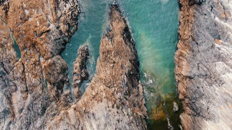 Top-view-aerial-of-cliff-at-the-atlantic-ocean-in-brittany-France