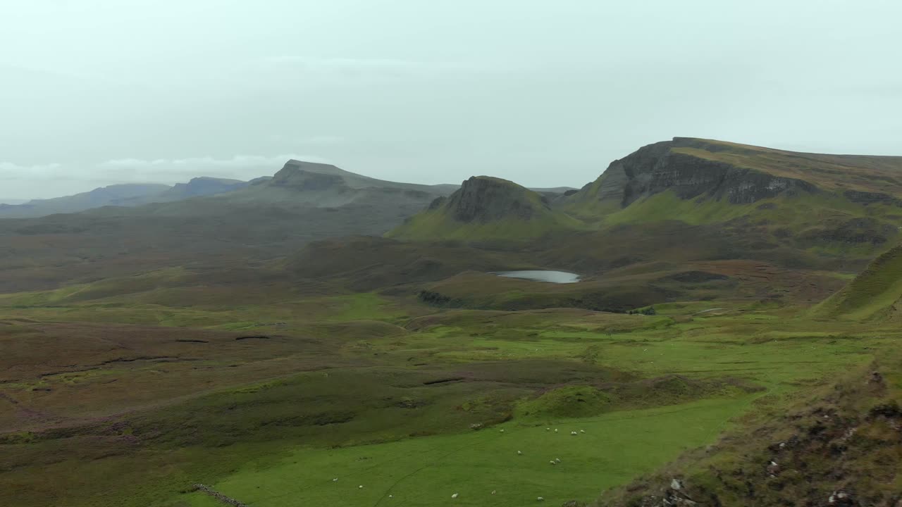 Stunning Aerial footage of the beautiful Quiraing landscape on the Isle of Skye, Scotland, UK. The Quiraing Landslip is on the northernmost summit of the Trotternish on the Isle of Skye, Scotland.