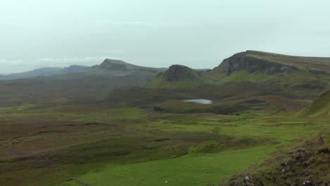 stunning aerial footage of the beautiful quiraing landscape on the isle of skye, scotland, uk. the quiraing landslip is on the northernmost summit of the trotternish on the isle of skye, scotland.