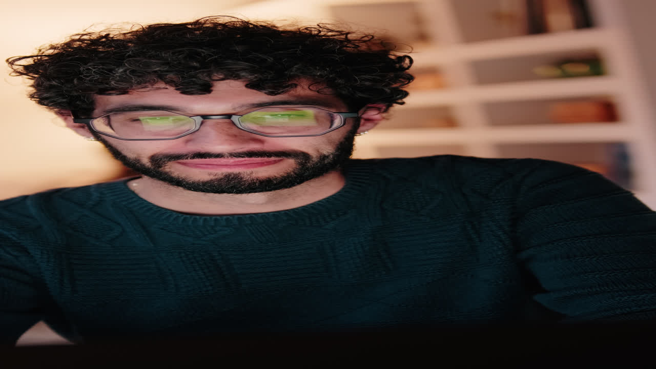 Gay Couple Working From Home on Laptop