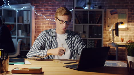 man working late at night in the office