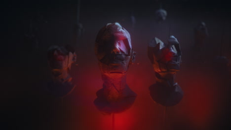 three crushed android heads on spikes in hell
