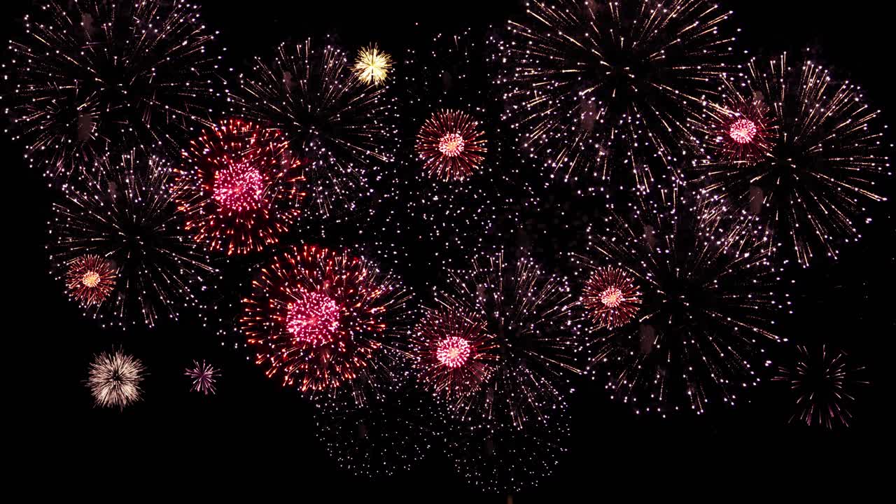 4k new years eve fireworks celebration loop of real fireworks background abstract golden shining