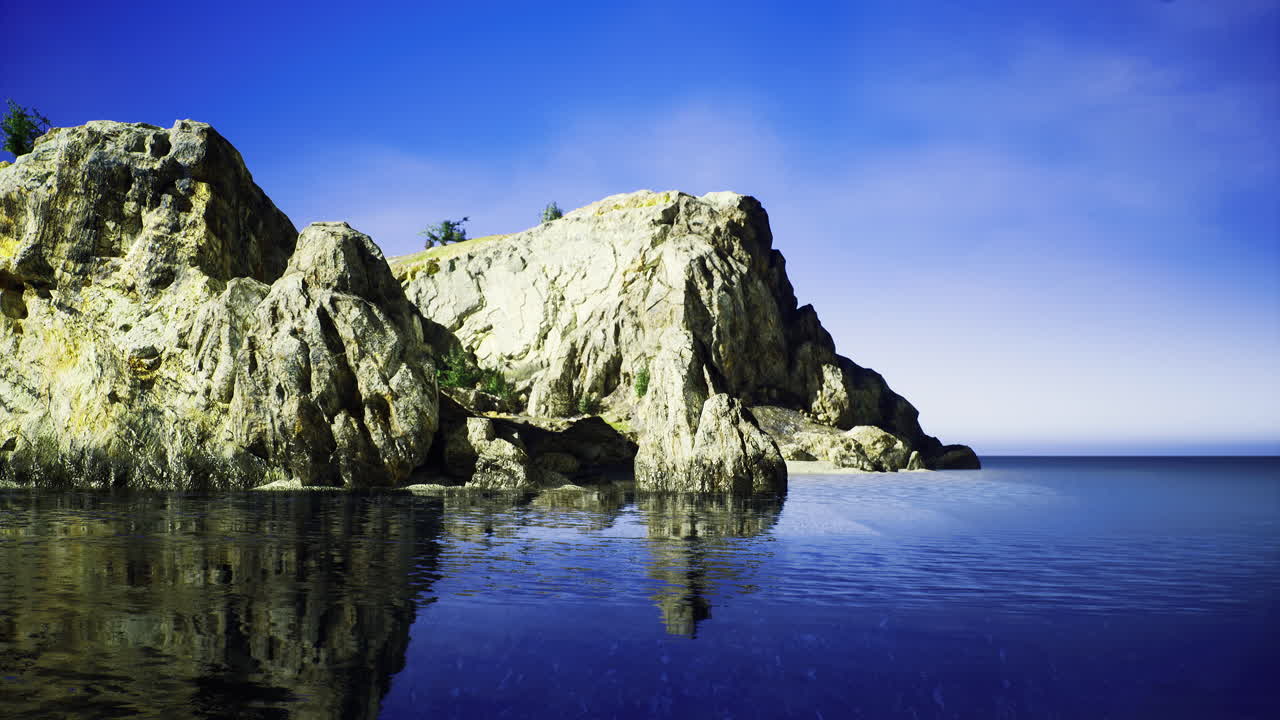 Majestic rocky coastline reflecting in tranquil waters at dawn