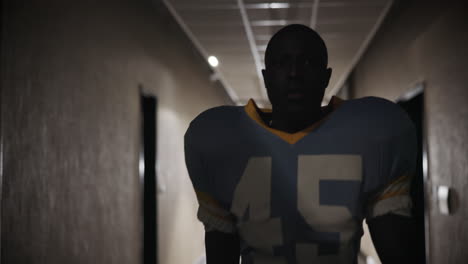 football player in a hallway