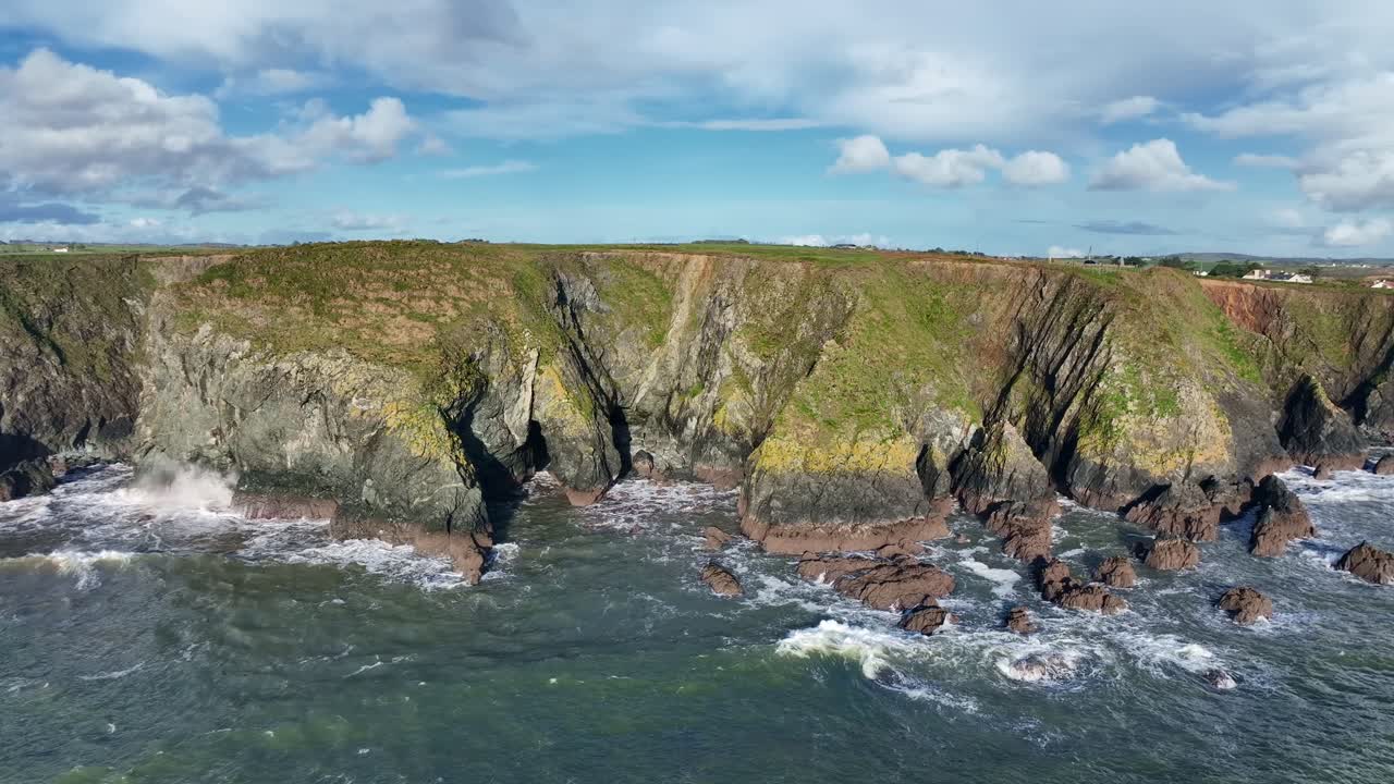 Ireland Epic Locations drone flying right along dramatic sea cliffs on The Copper Coast Waterford
