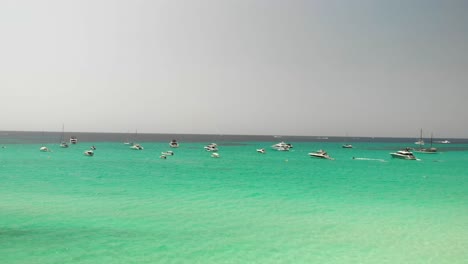 Spain,-Mallorca-Platja-des-Trenc-beach-a-beautiful-fly-by-over-the-beach-at-4k-24-fps-with-ND-filters-on-a-very-bright-day-with-a-DJI-Mavic-Air-drone