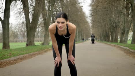 young exhausted sport girl is resting after cross, healthy lifestyle, sport conception