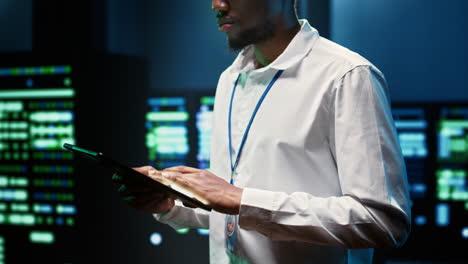 engineer checking blade servers