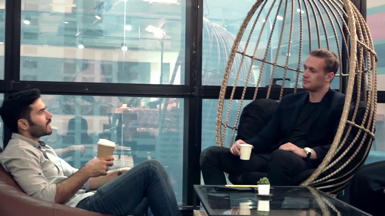 Office worker relax at coffee corner while taking a short break from work.