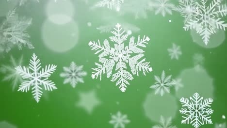 copos de nieve sobre un fondo verde