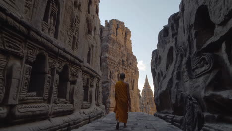 monk walking through ancient temple ruins