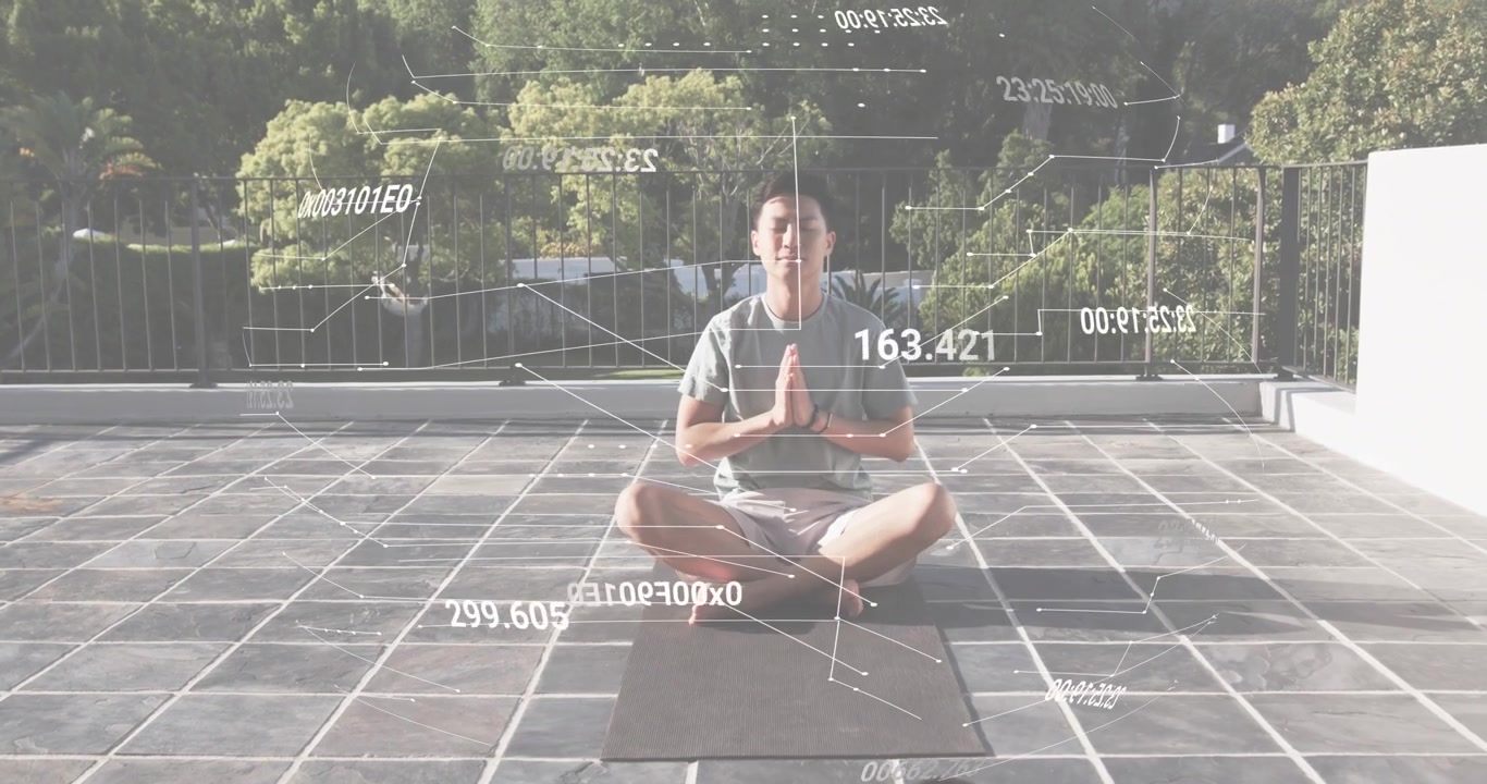 man doing yoga on balcony mat opening eyes launching health charts during cat-cow and upward dog