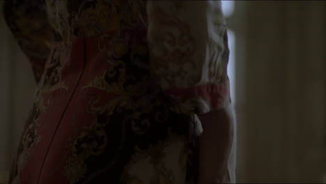 woman in a baroque-style dress
