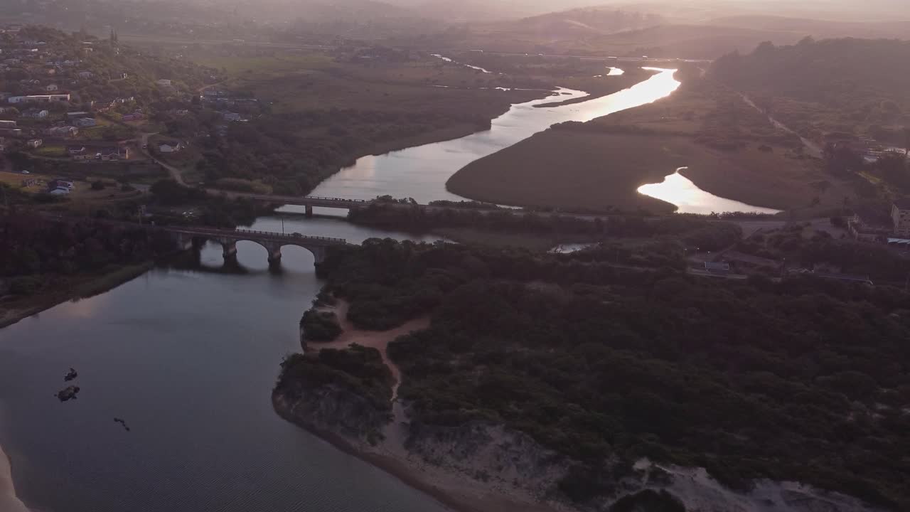 Scenic sunset at the Msimbazi river at the Illovo beach in Durban in South Africa , dolly shot