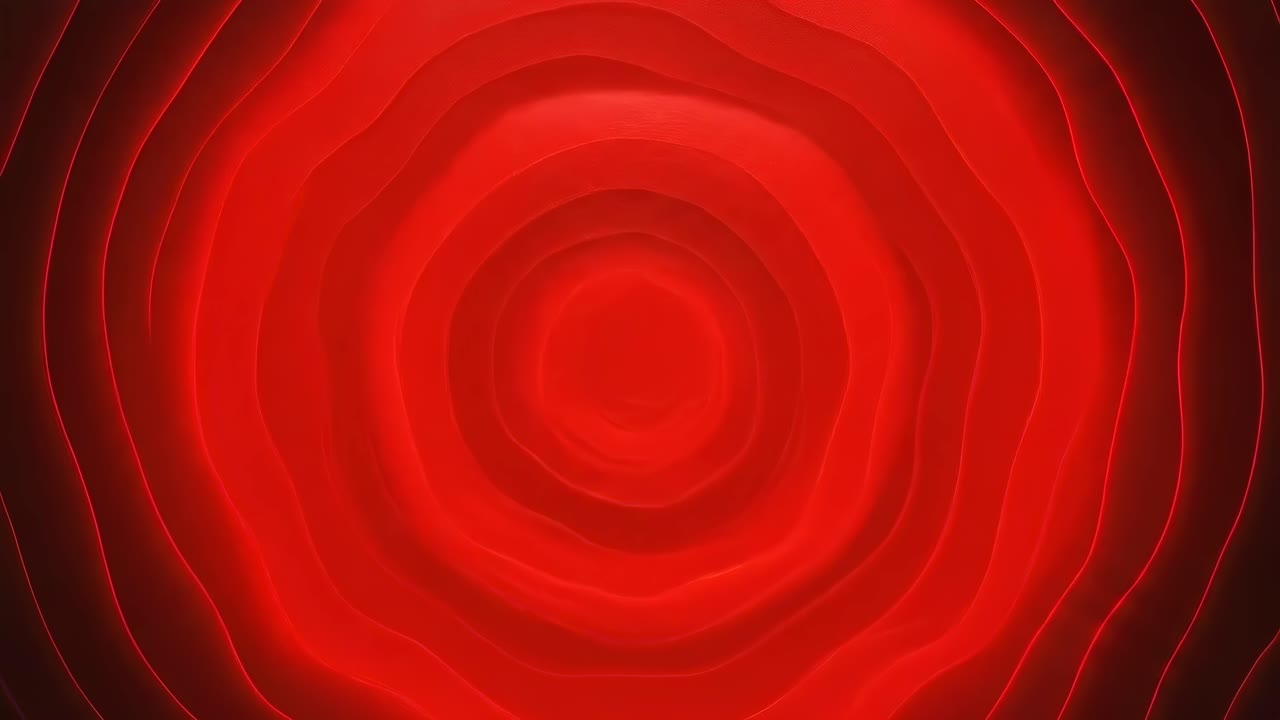 Video astratto con cerchi rossi concentrici ripresi dall'alto, che creano un effetto tunnel.
