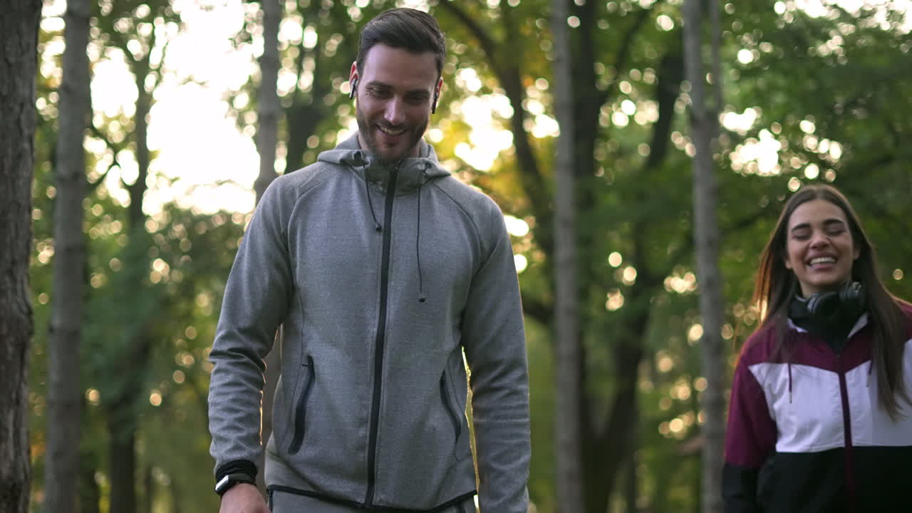 Couple jogging in a forest