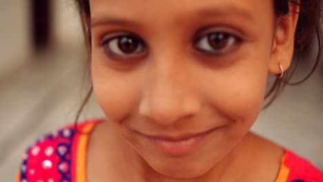 portrait of an indian child at home during coronavirus lockdown