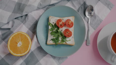 simple cream cheese toast with tomatoes and parsley