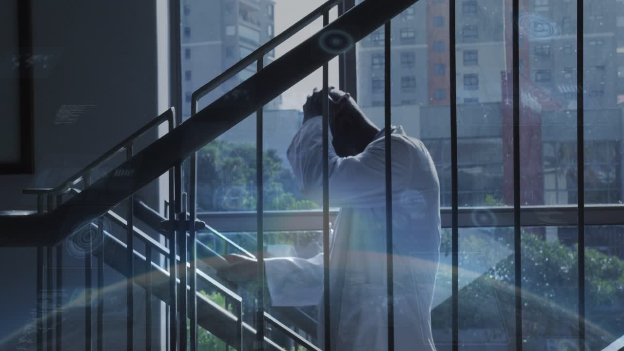 Mature man leaning on rail, rubbing head and tilting up, reacting to animated sun streaks, health
