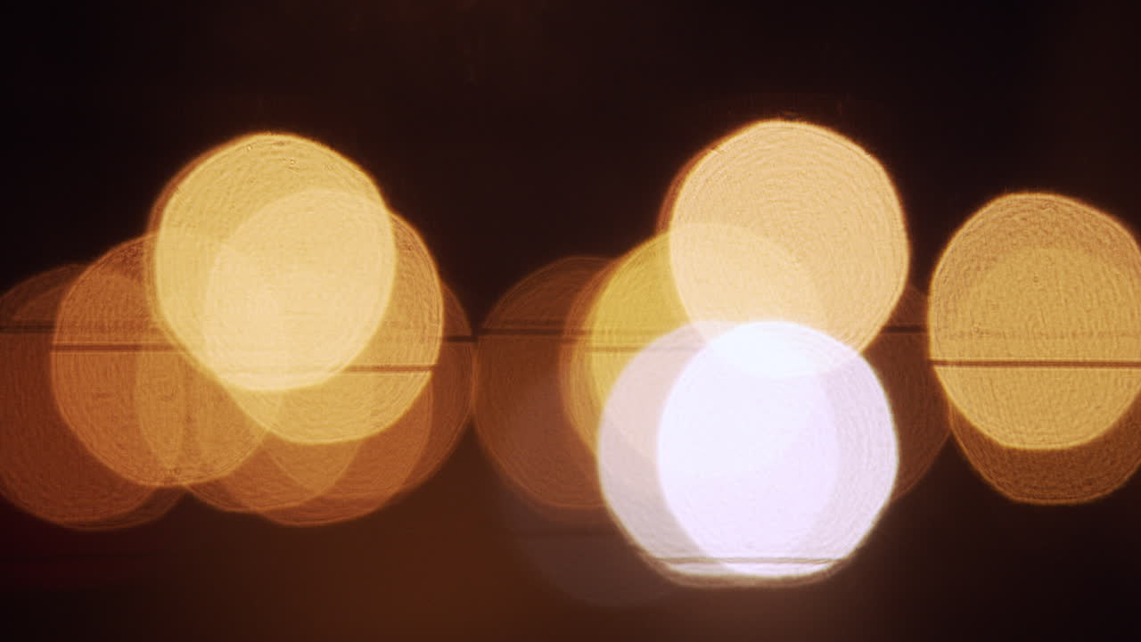 Blurred car lights at night - atmospheric scene