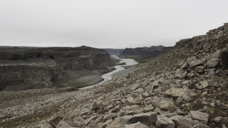 smooth dolly out landscape shot across the bleak wilderness around jokulsa a fjollum river iceland